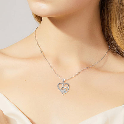Zahira™ | Collar de plata con huella de pata y corazón y circonitas