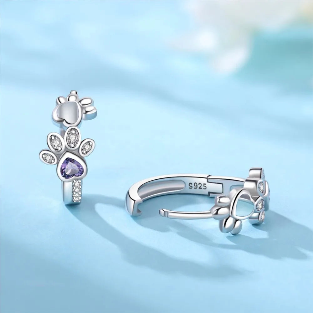 Elixane™ | Silver Paw-Print Huggie Earrings