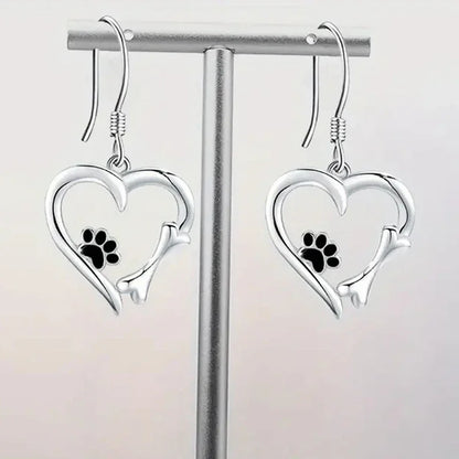 Brisia™ | Pendientes de plata con forma de corazón y huella