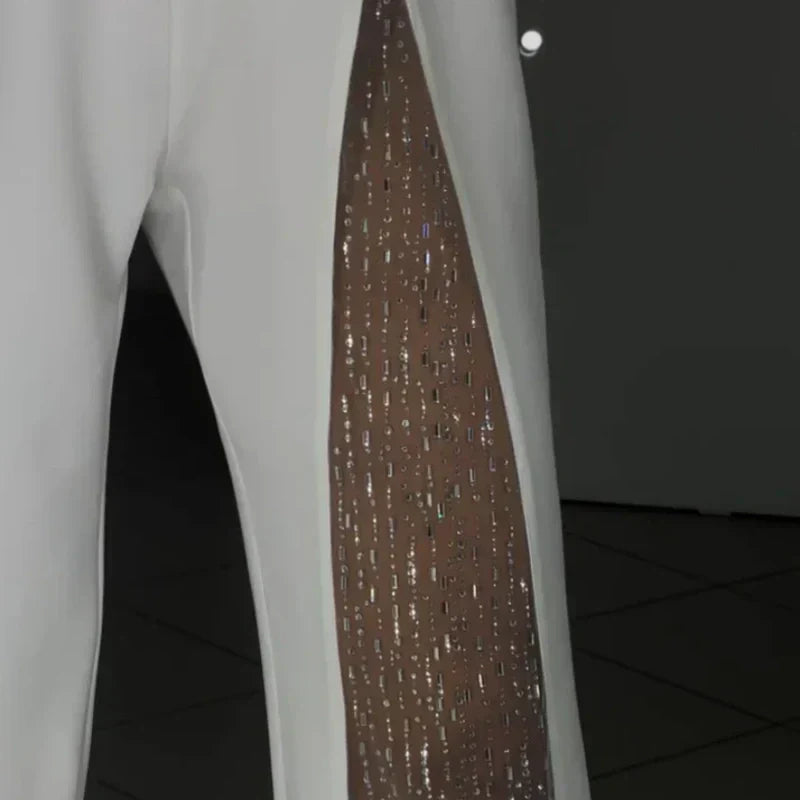 Mono de mujer de un solo hombro en malla brillante con parte superior acampanada