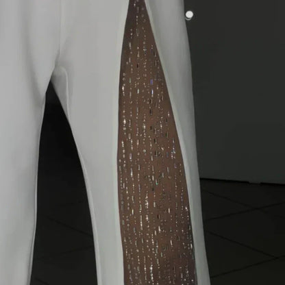 Mono de mujer de un solo hombro en malla brillante con parte superior acampanada